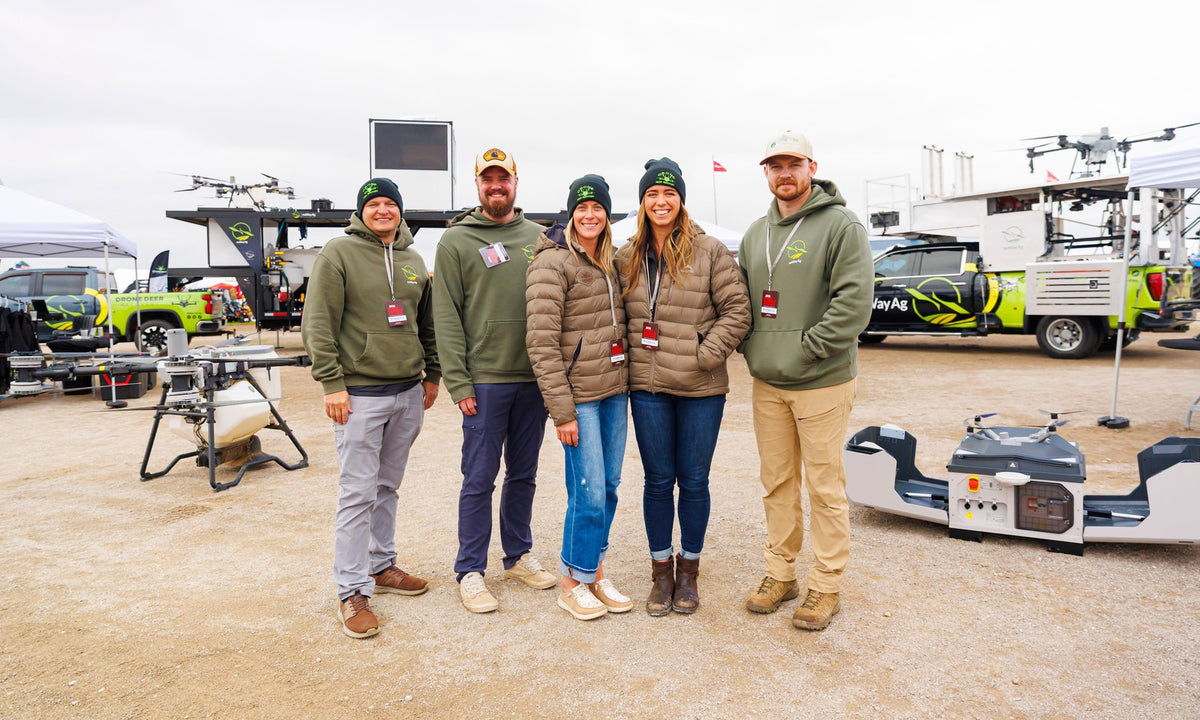 HLE Drones team at Farm Science Review 2026 with our drone lineup: DJI Agras spray drones, a heavy-lift drone and a DJI Dock 3